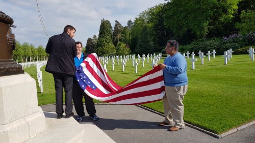Foulding the flag in US Cemetery